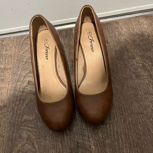 Brown faux leather wedges